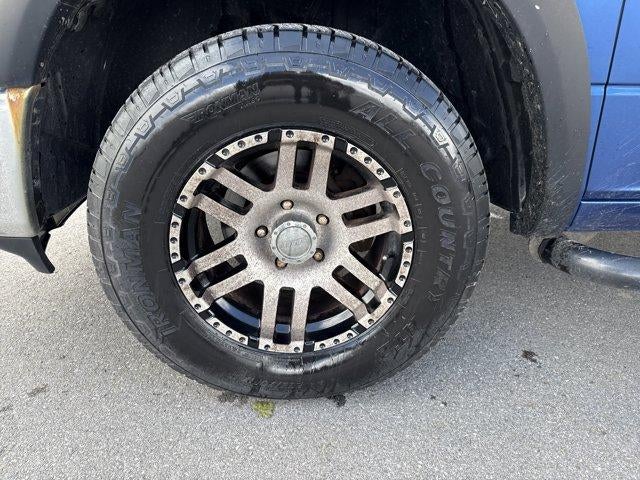 2011 RAM 1500 4WD Quad Cab 6.3 Ft Box ST