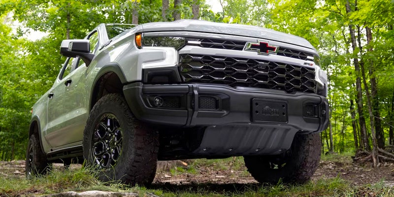 Silverado 1500 on a green off-road trail